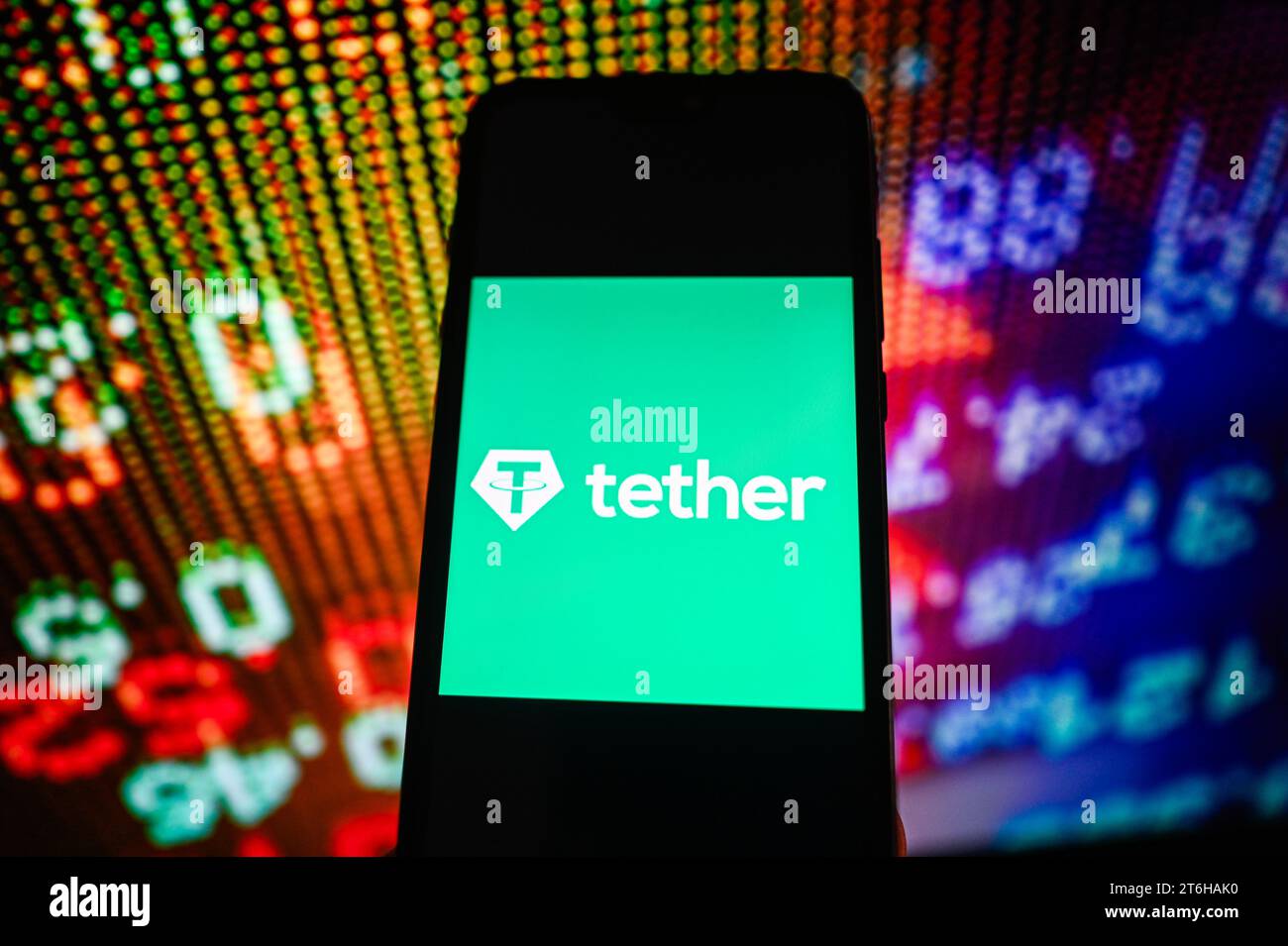 In this photo illustration a Tether logo is displayed on a smartphone ...