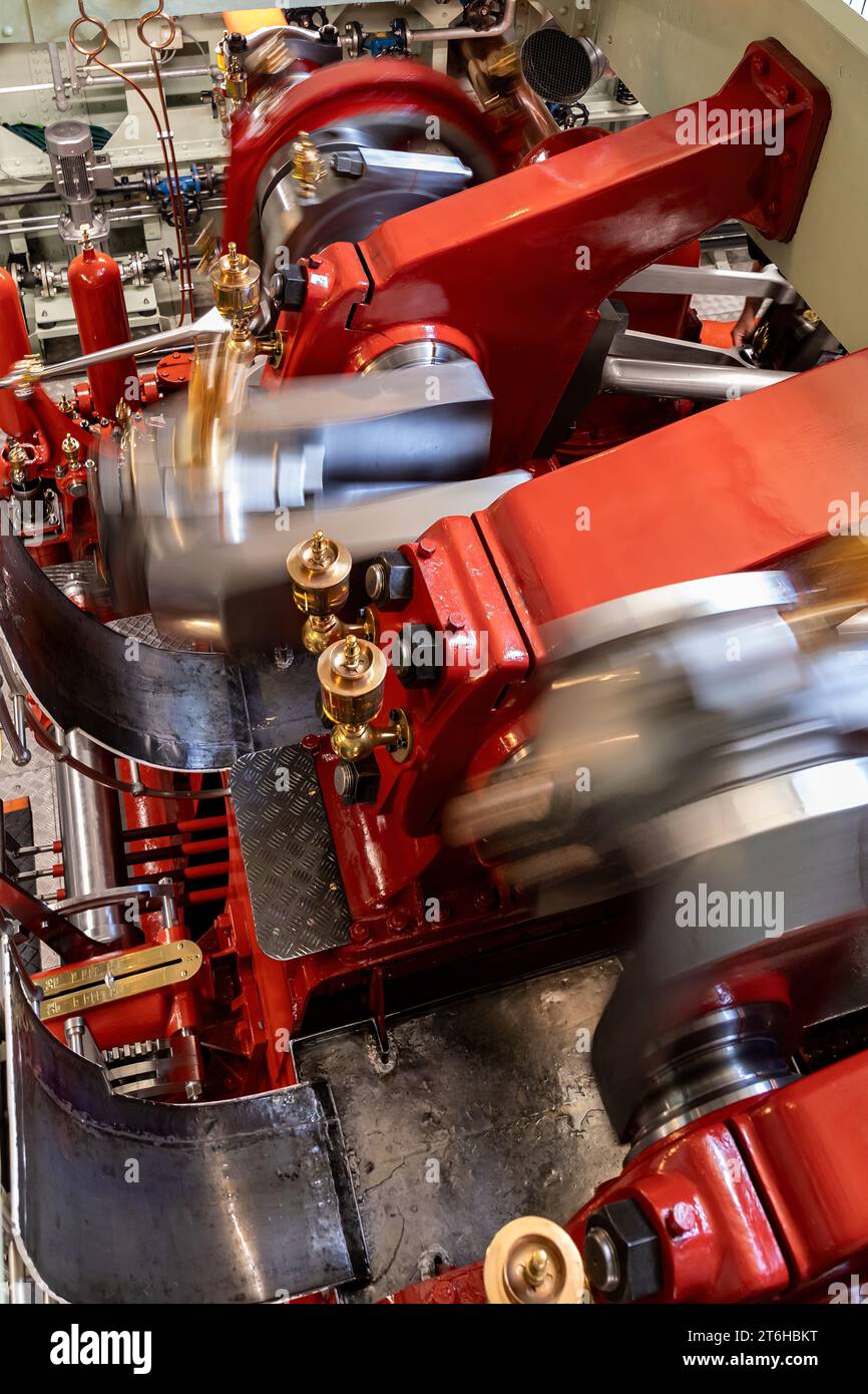 steam engine in engine room of steamboat while running showing motion