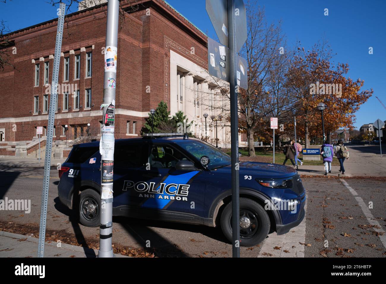 Ann Arbor Police car driving by Hill Auditorium on the University of