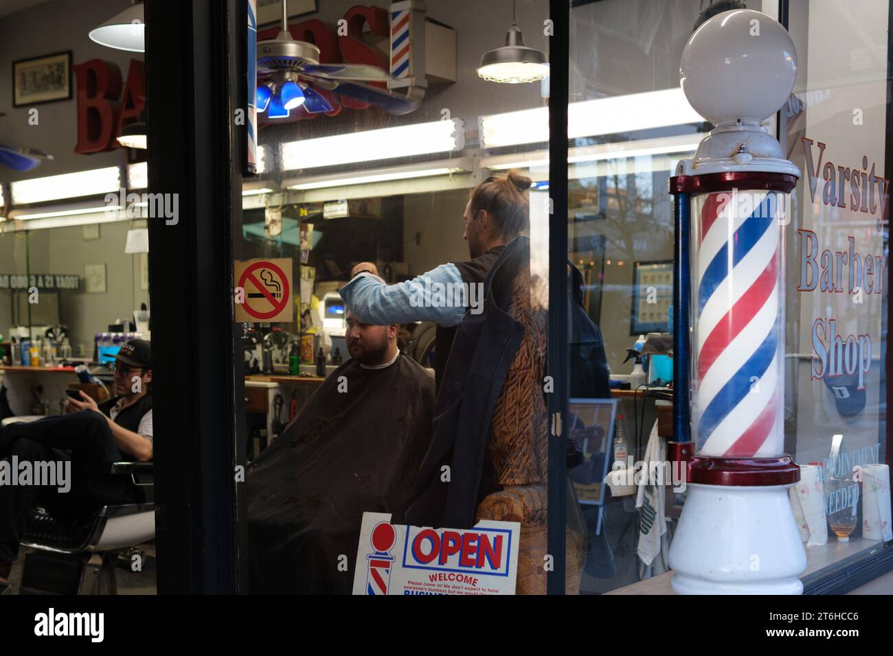 View through the window of a barber shop in Ann Arbor Michigan USA Stock Photo