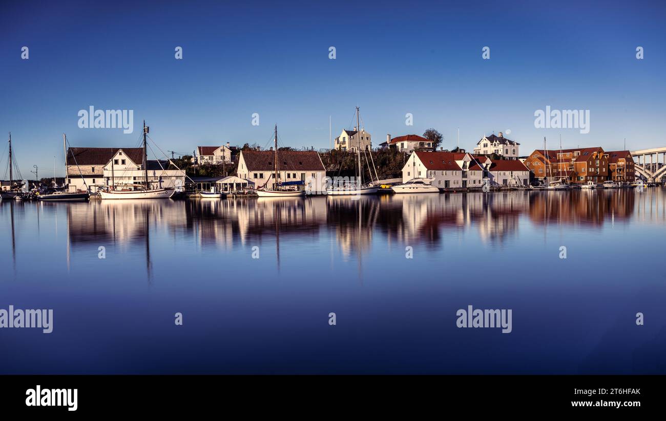 Houses on the Haugesund waterfront in the small Norwegian town. Stock Photo