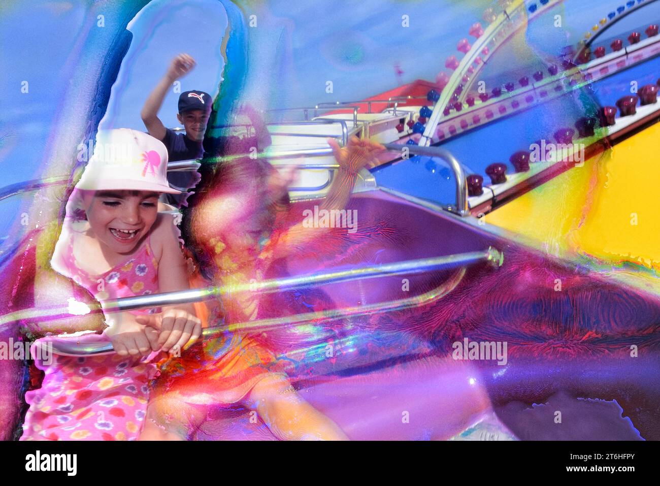 Screaming kids on a fairground ride at Mablethorpe. Lincolnshire. England. UK Stock Photo