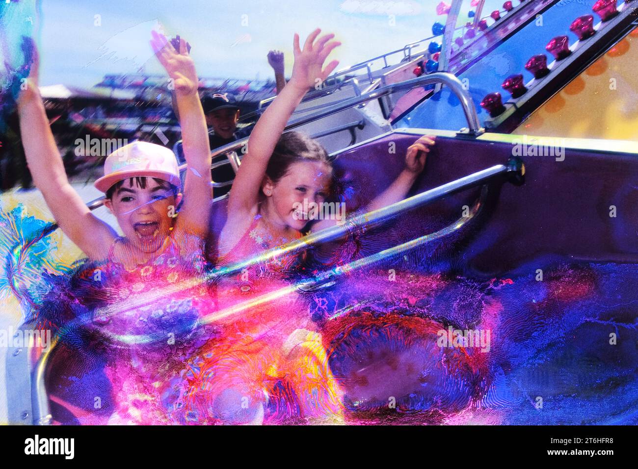 Screaming kids on a fairground ride at Mablethorpe. Lincolnshire. England. UK Stock Photo