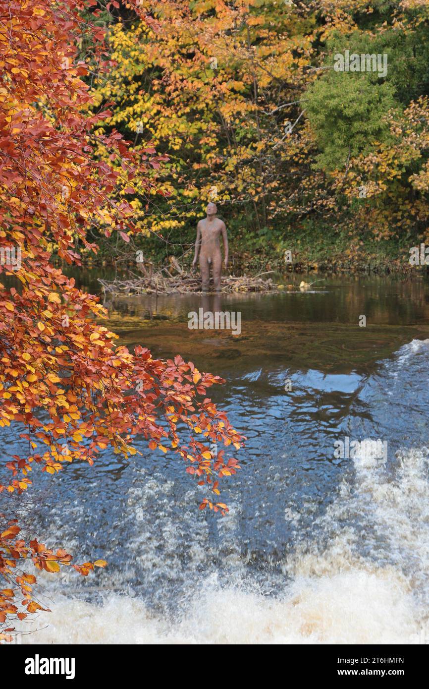 Edinburgh a lifesized sculpture by Antony Gormley, moulded from his own body, stands in the