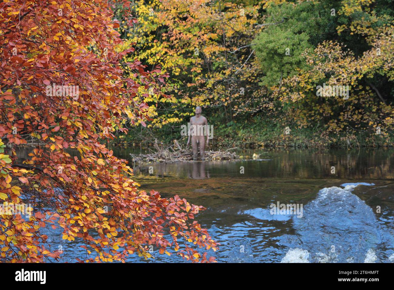 Edinburgh a lifesized sculpture by Antony Gormley, moulded from his own body, stands in the