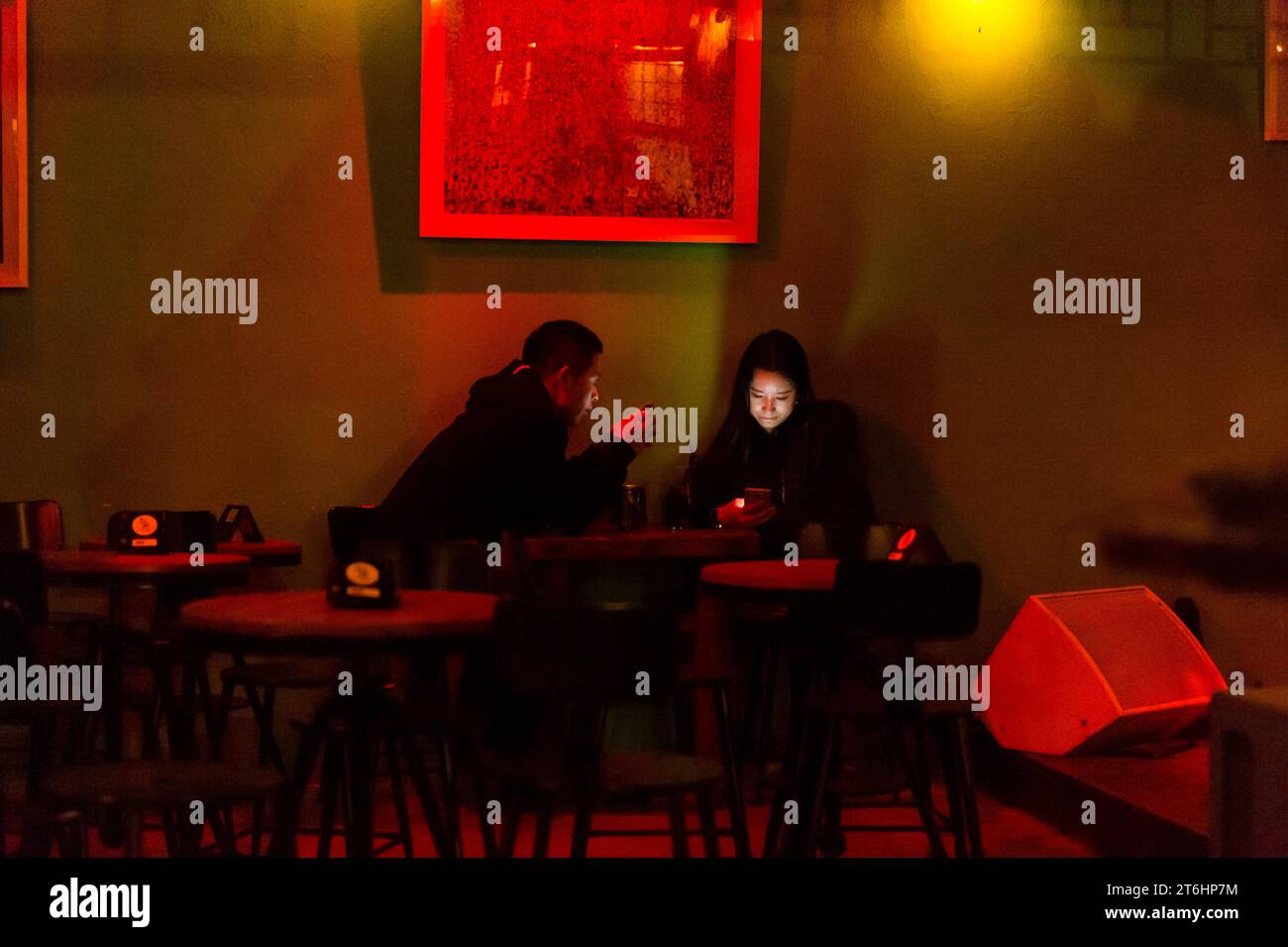 China, Peking, young couple in bar Stock Photo