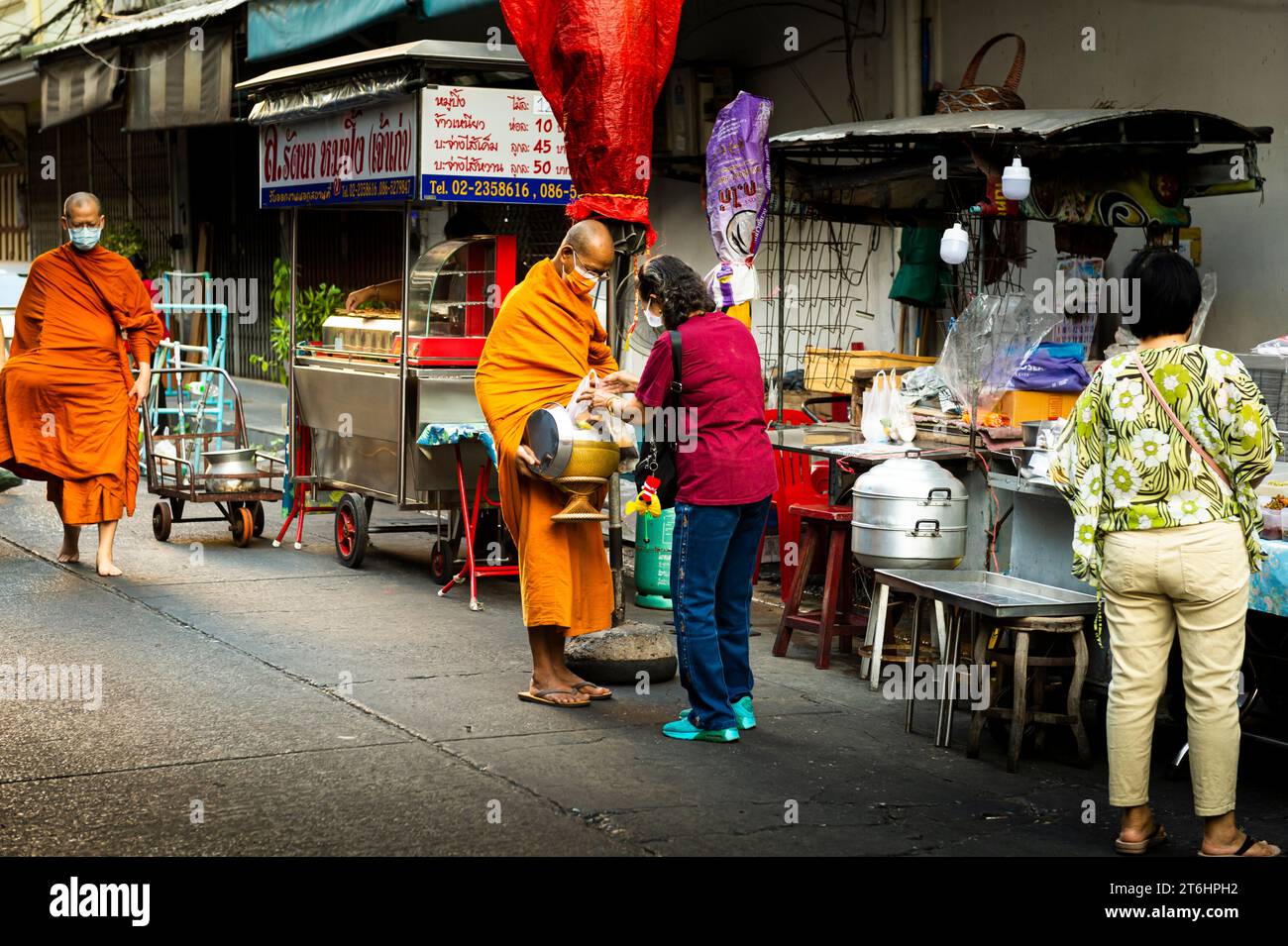 Thailand, Bangkok, monks around Taksin Station Stock Photo