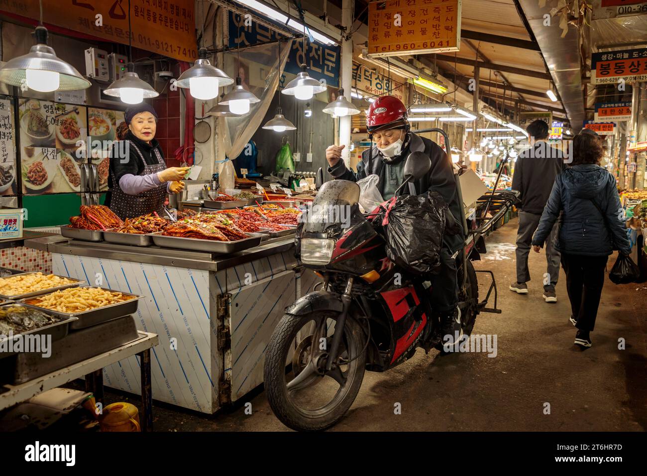 Man with motorcycle at weekly market, South Korea Stock Photo