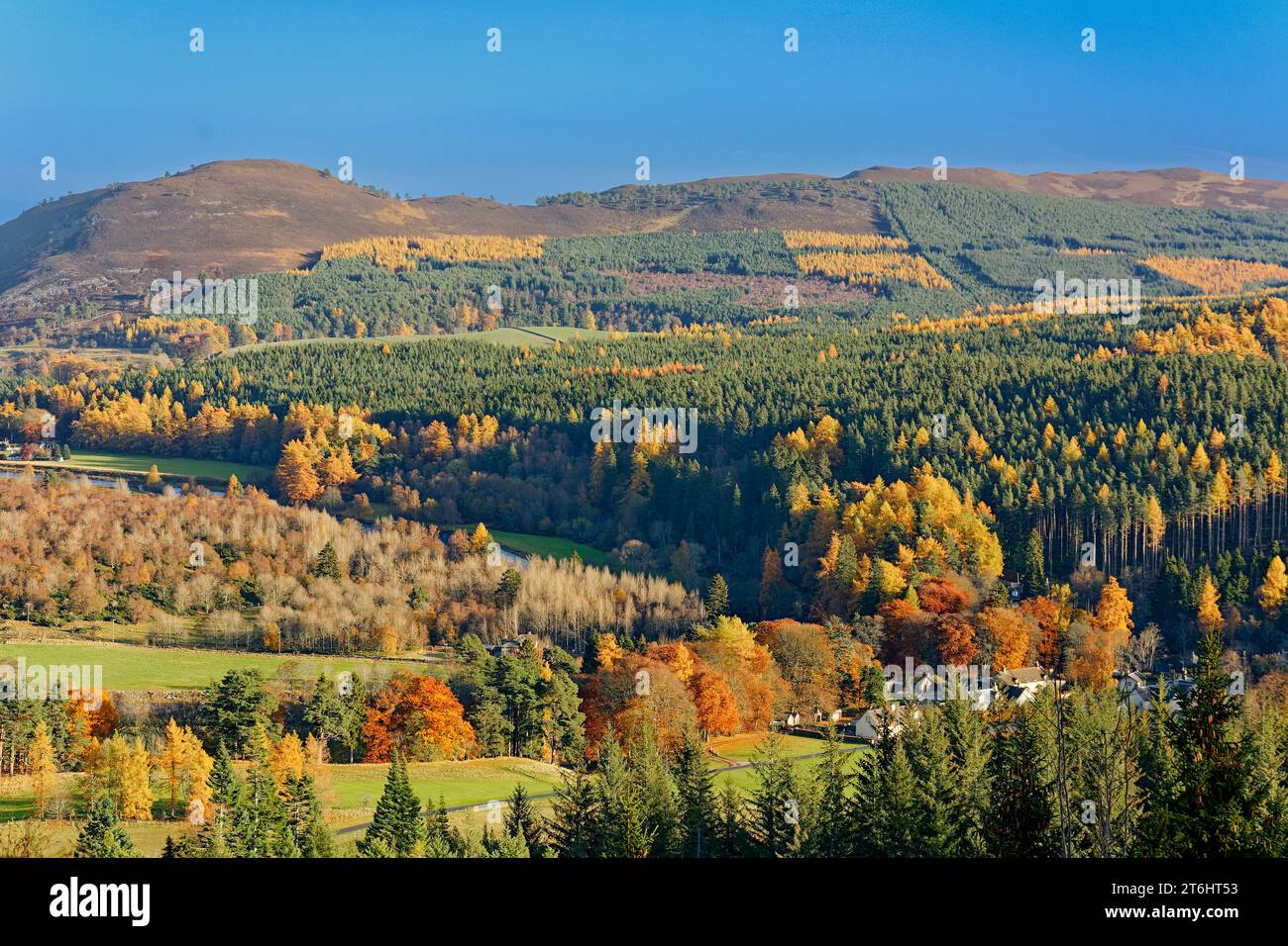 Balmoral Estates Crathie Scotland sunshine over estate houses the hills