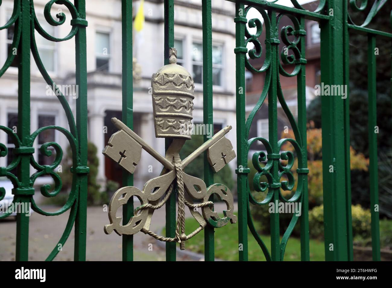 The Vatican’s coat of arms, on the gate of the Vatican’s embassy in the UK – officially the Apostolic Nunciature to Great Britain, in Wimbledon, Londo Stock Photo