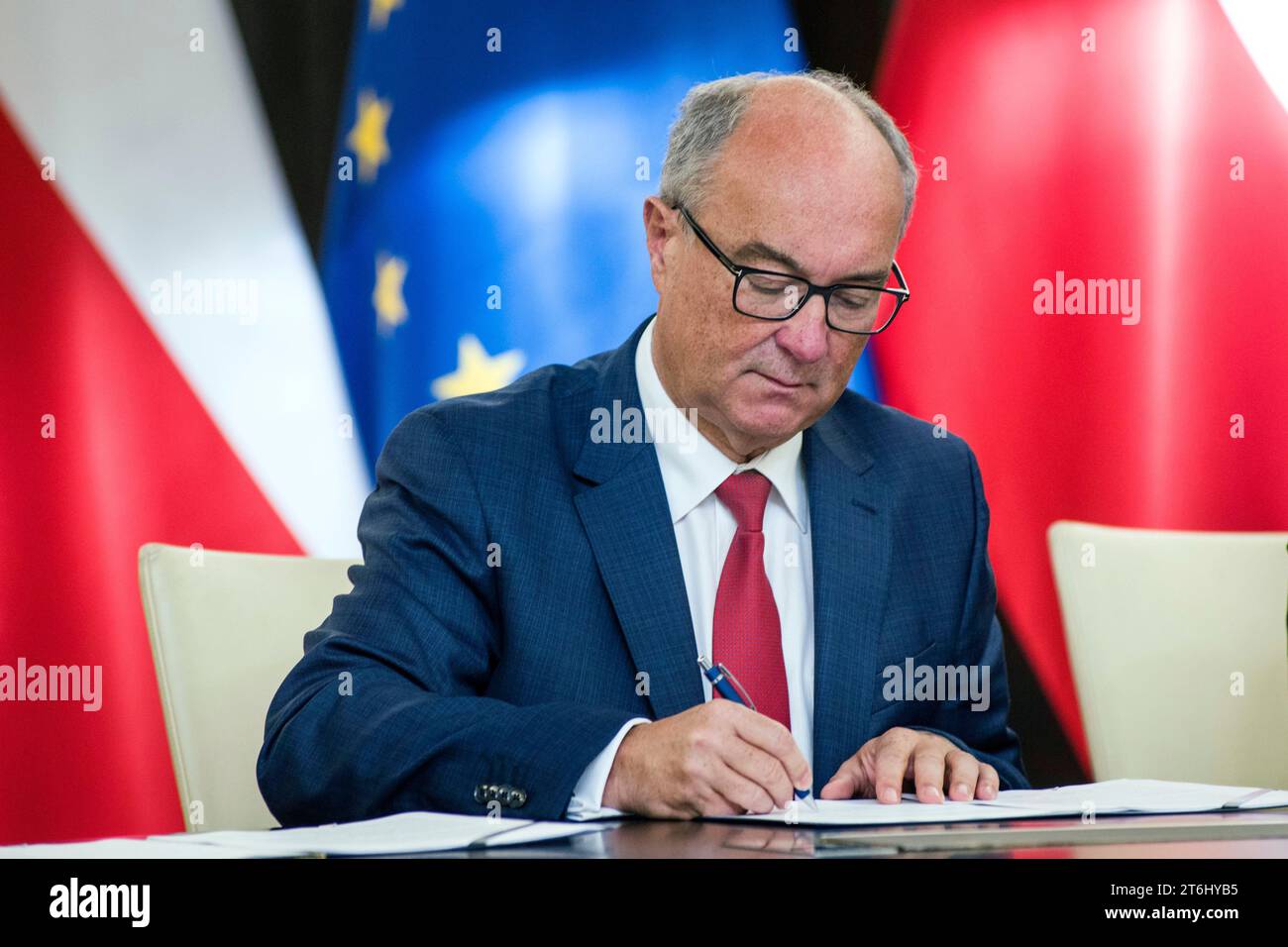 Wlodzimierz Czarzasty, the co-chairman of the New Left party, signs the coalition agreement in the Parliament. The leaders of Polish opposition parties have signed a coalition agreement that lays out a road map for governing the nation over the next four years. The parties collectively won a majority of votes in last month's parliamentary election. Their candidate to be the next prime minister is Donald Tusk, a former prime minister who leads the largest of the opposition parties, the centrist Civic Platform. Tusk said the parties worked to seal their agreement a day before the Independence Da Stock Photo