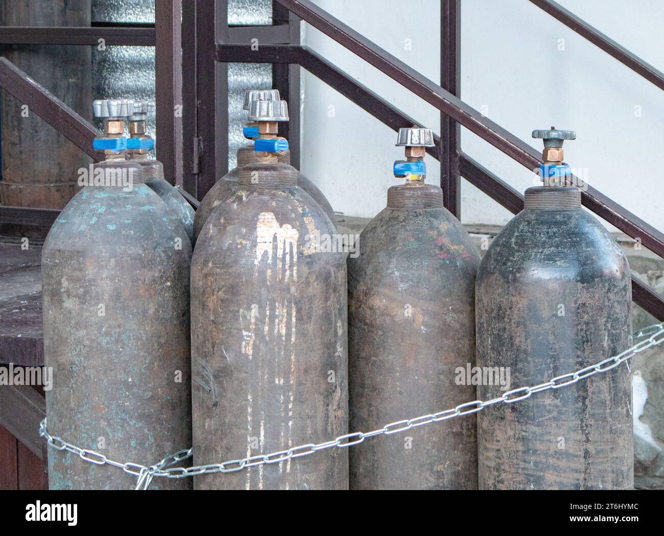 Closeup of steel cylinders with compressed gas argon, carbon dioxide