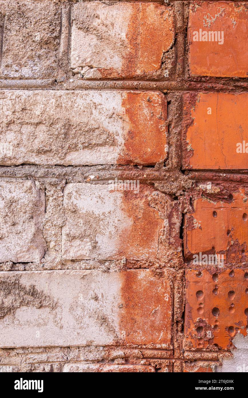 Old wall with bricks, house facade, wallpaper Stock Photo