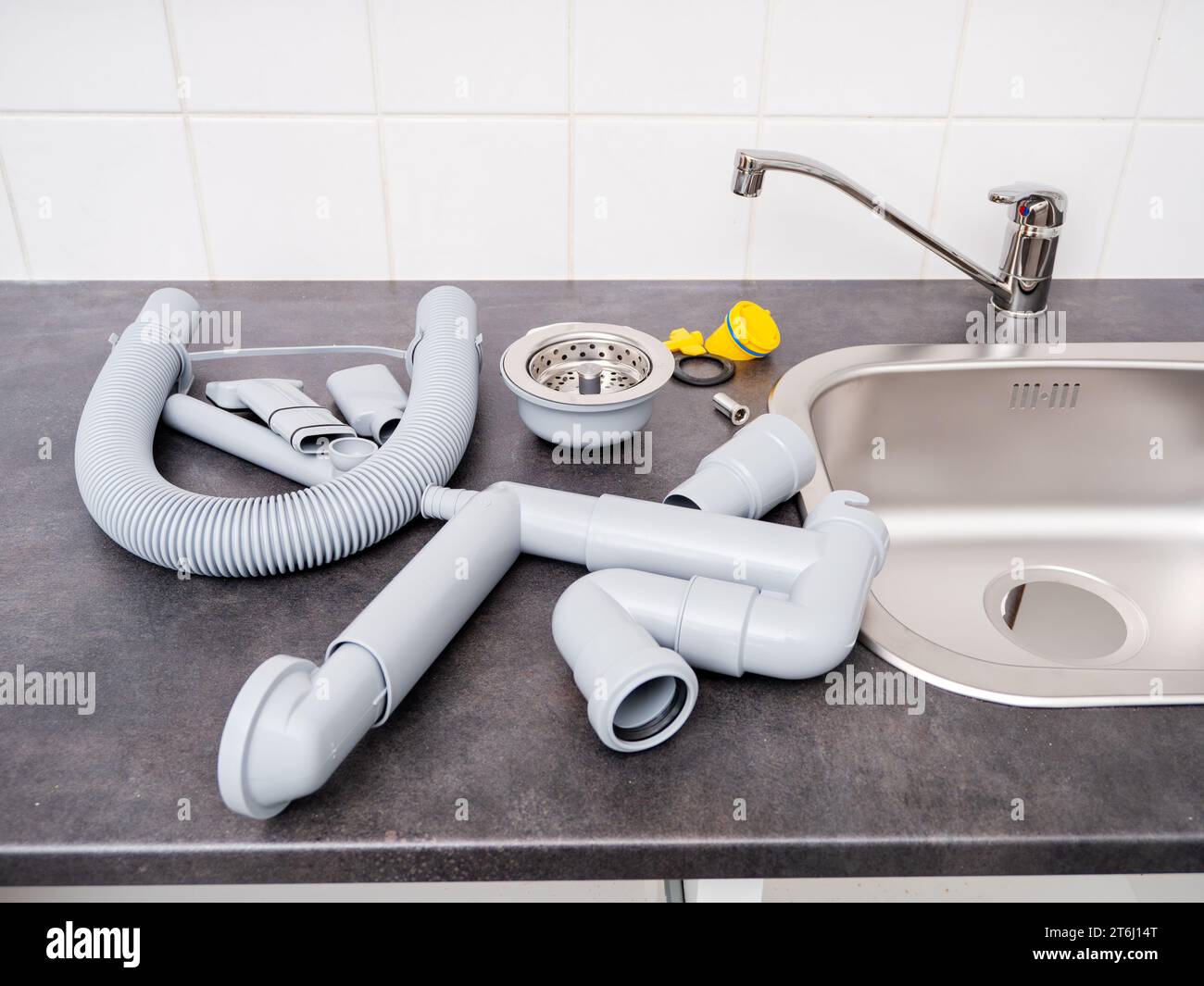 plumbing, disassembled kitchen faucet and mounting accessories Stock Photo  - Alamy