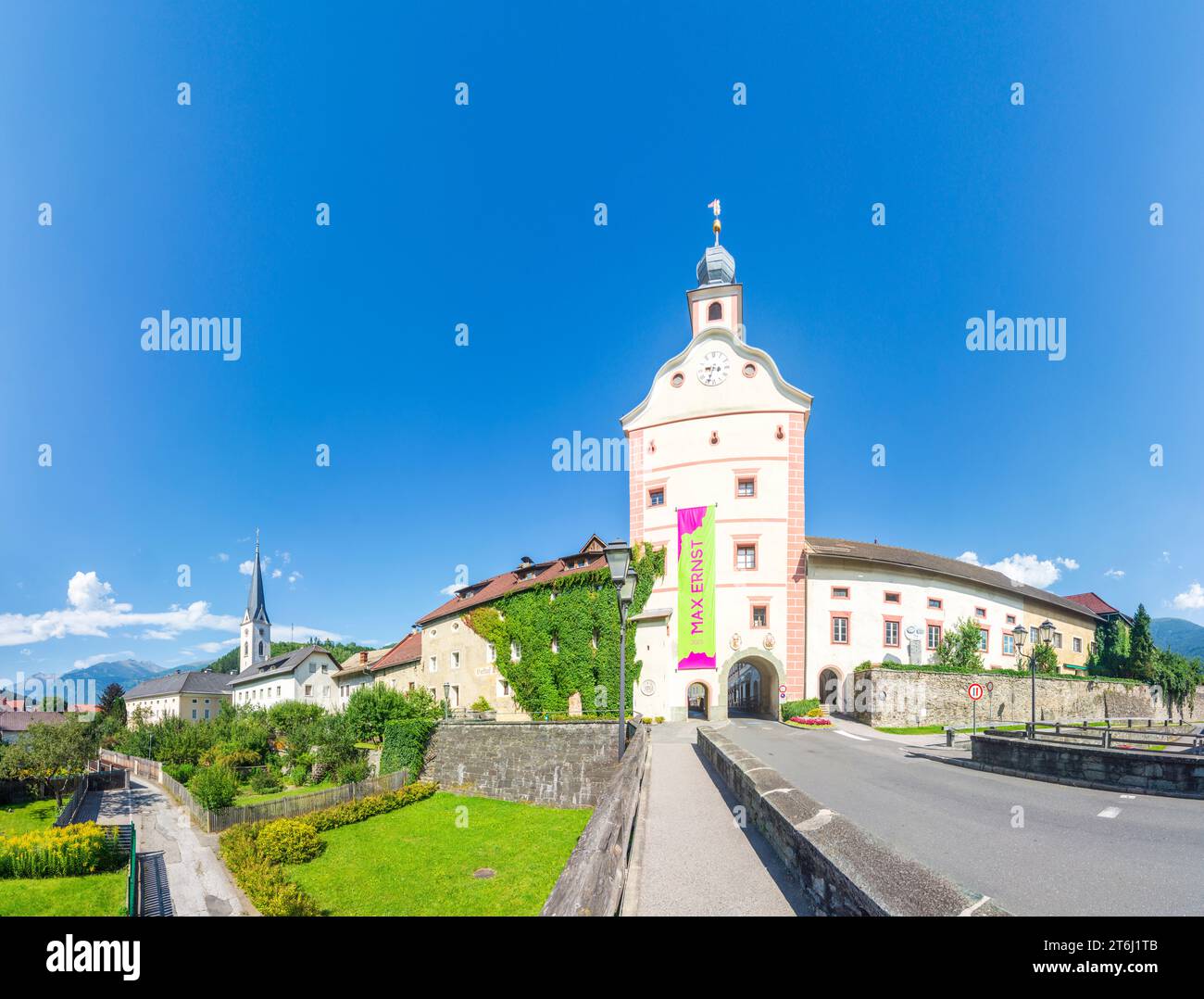 Gmünd in Kärnten, city gate Unteres Stadttor, church in Nationalpark Hohe Tauern, Carinthia, Austria Stock Photo