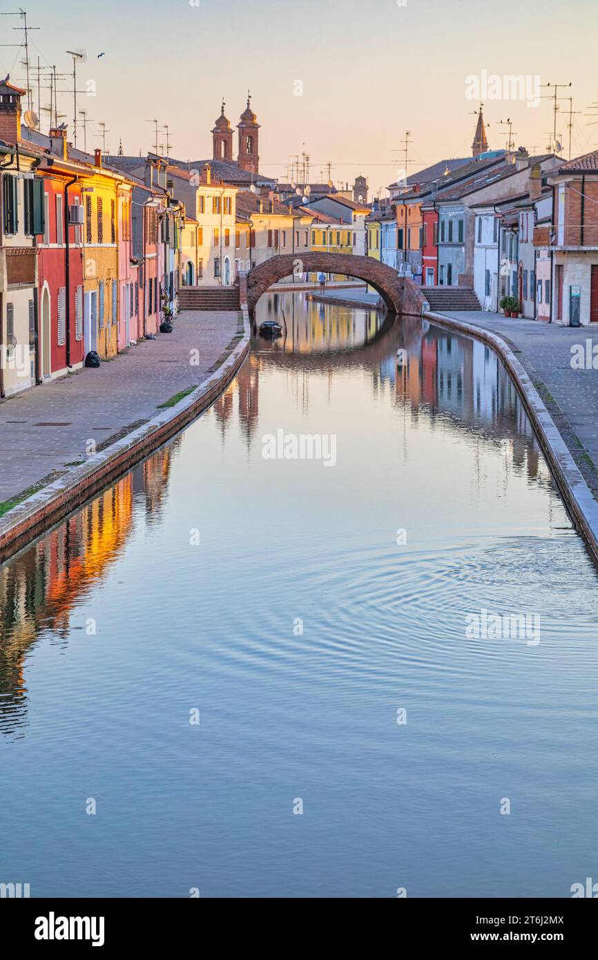 Italy, Emilia Romagna, province of Ferrara, Ponte San Pietro (St. Peter's Bridge) over a water canal in Comacchio Stock Photo