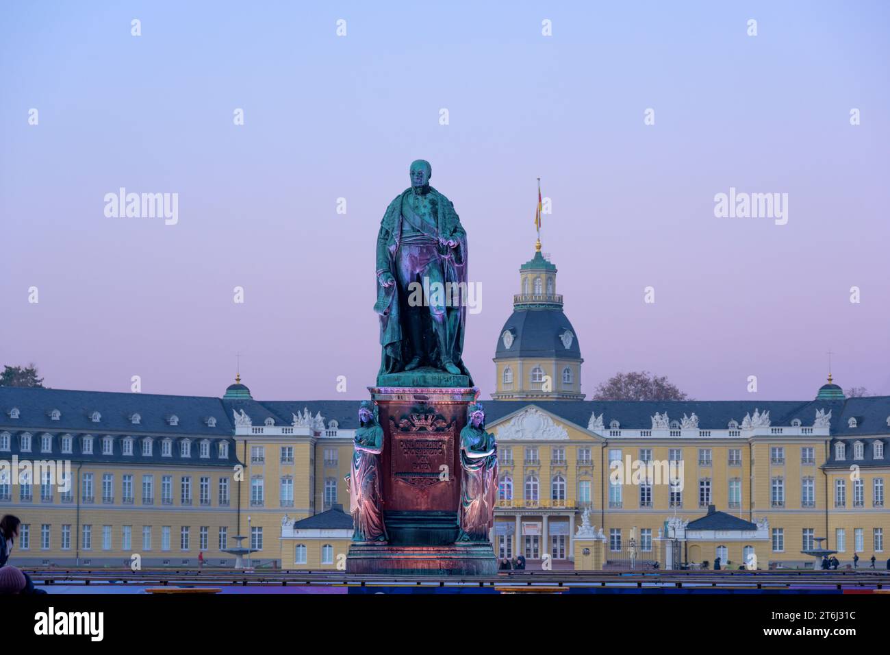 Germany, Baden-Württemberg, Karlsruhe, Karl Friedrich von Baden, statue in front of the castle. Stock Photo
