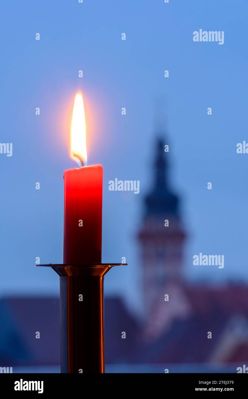 Candlelight at a window. Stock Photo