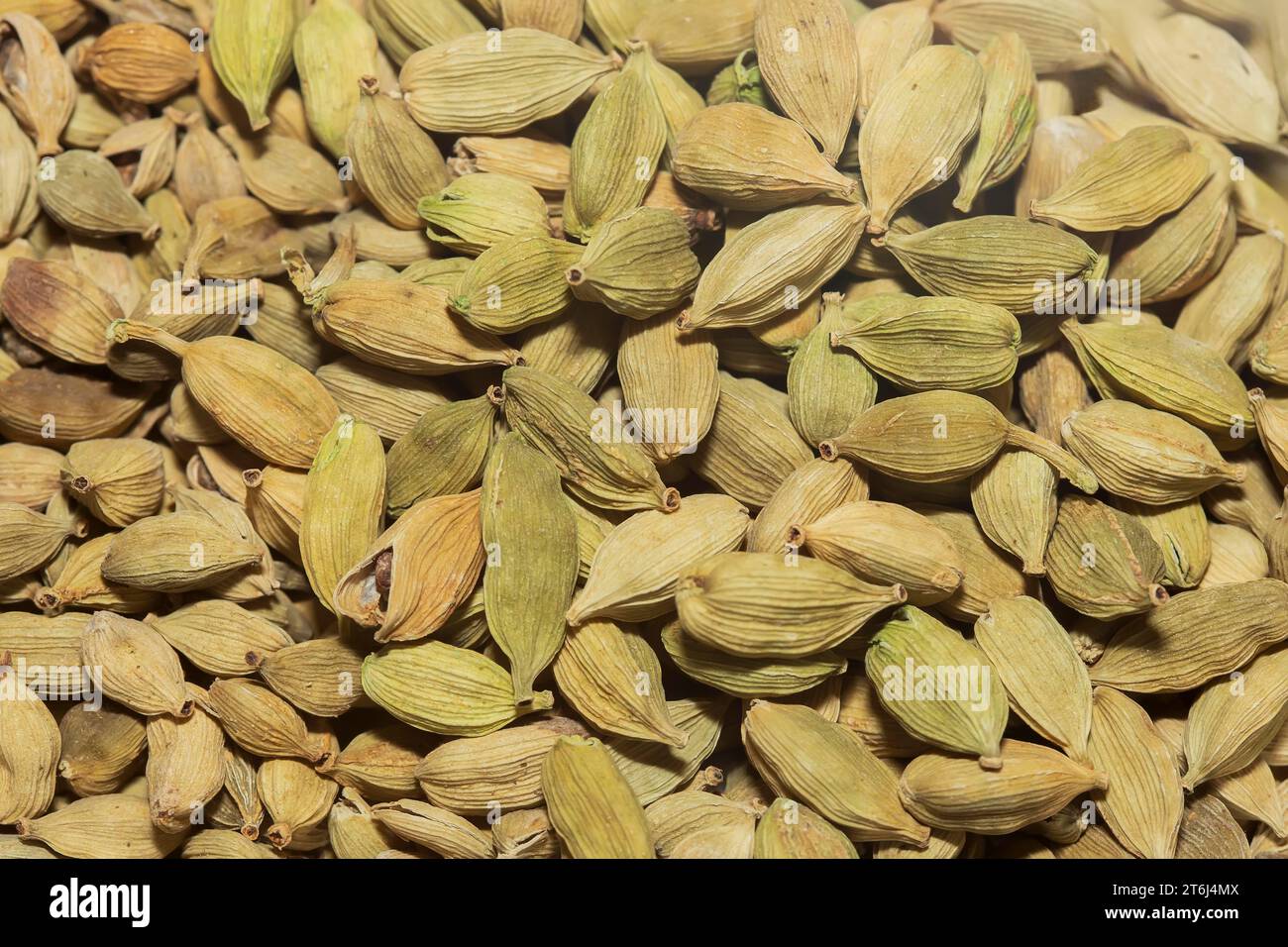 Large group of green cardamom seeds Stock Photo