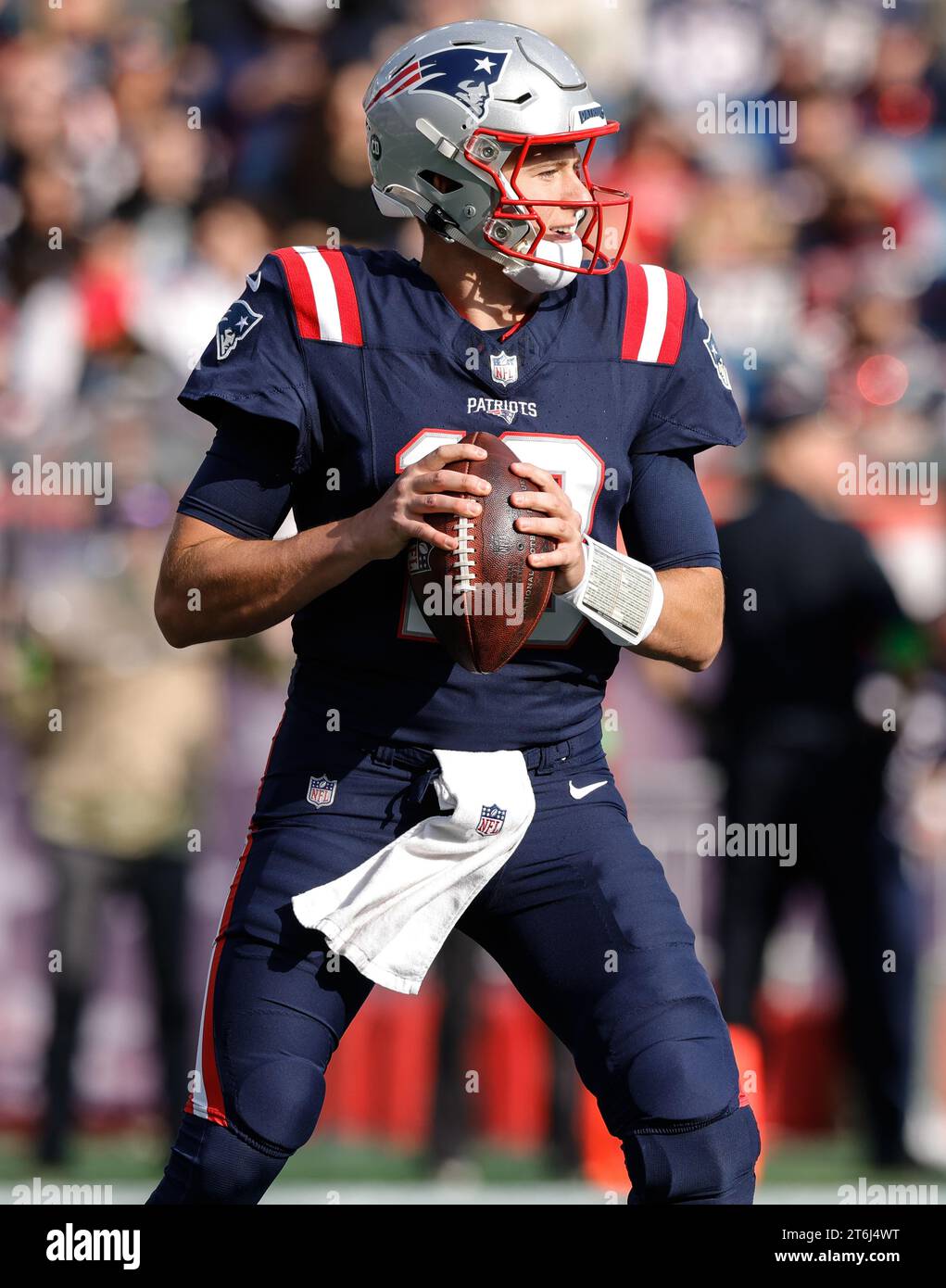 New England Patriots quarterback Mac Jones (10) looks for an open ...