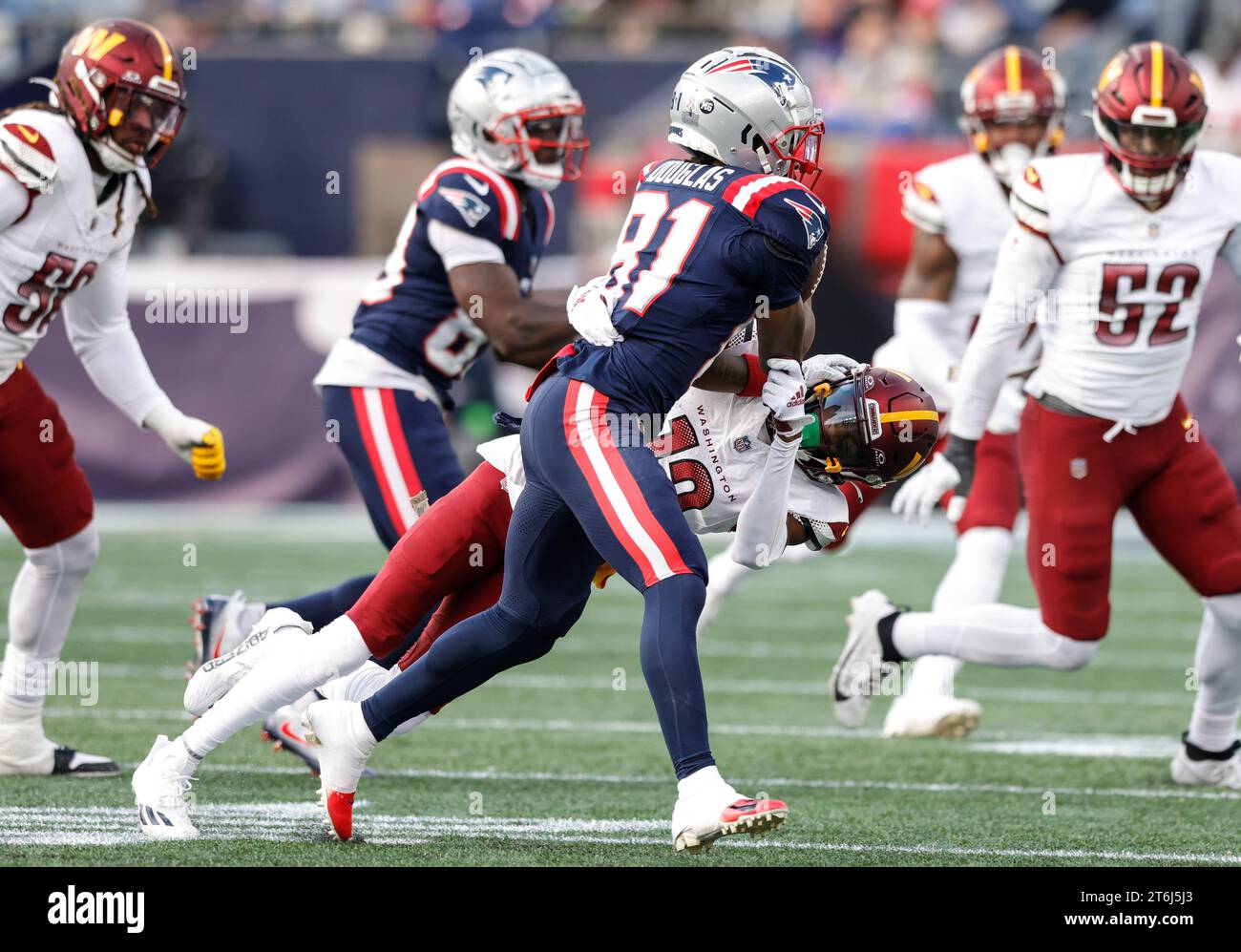 Washington Commanders cornerback Emmanuel Forbes Jr. (13) tackling