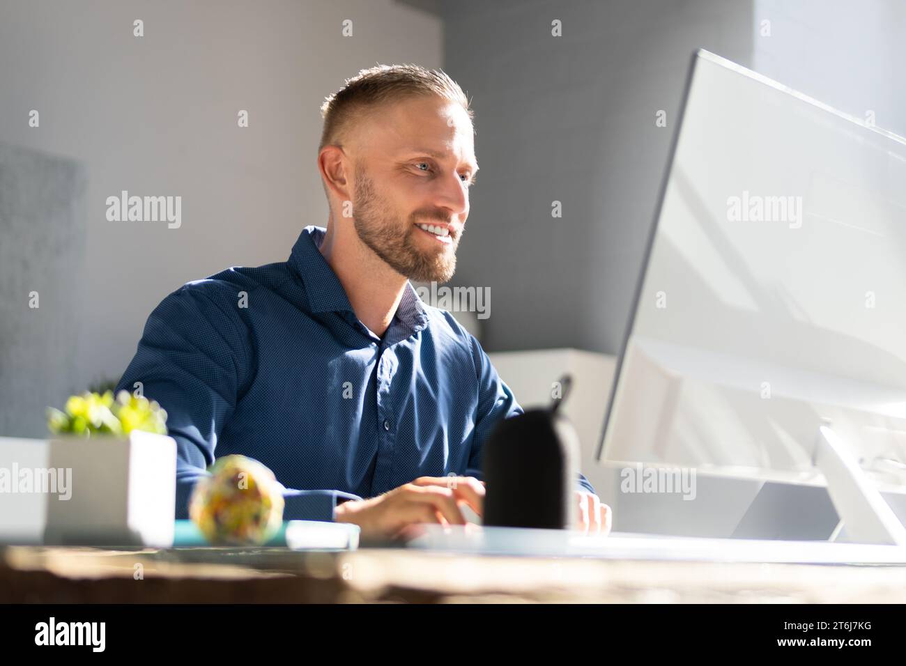 Man Using Computer on Desktop in Office: Employee Working Stock Photo ...