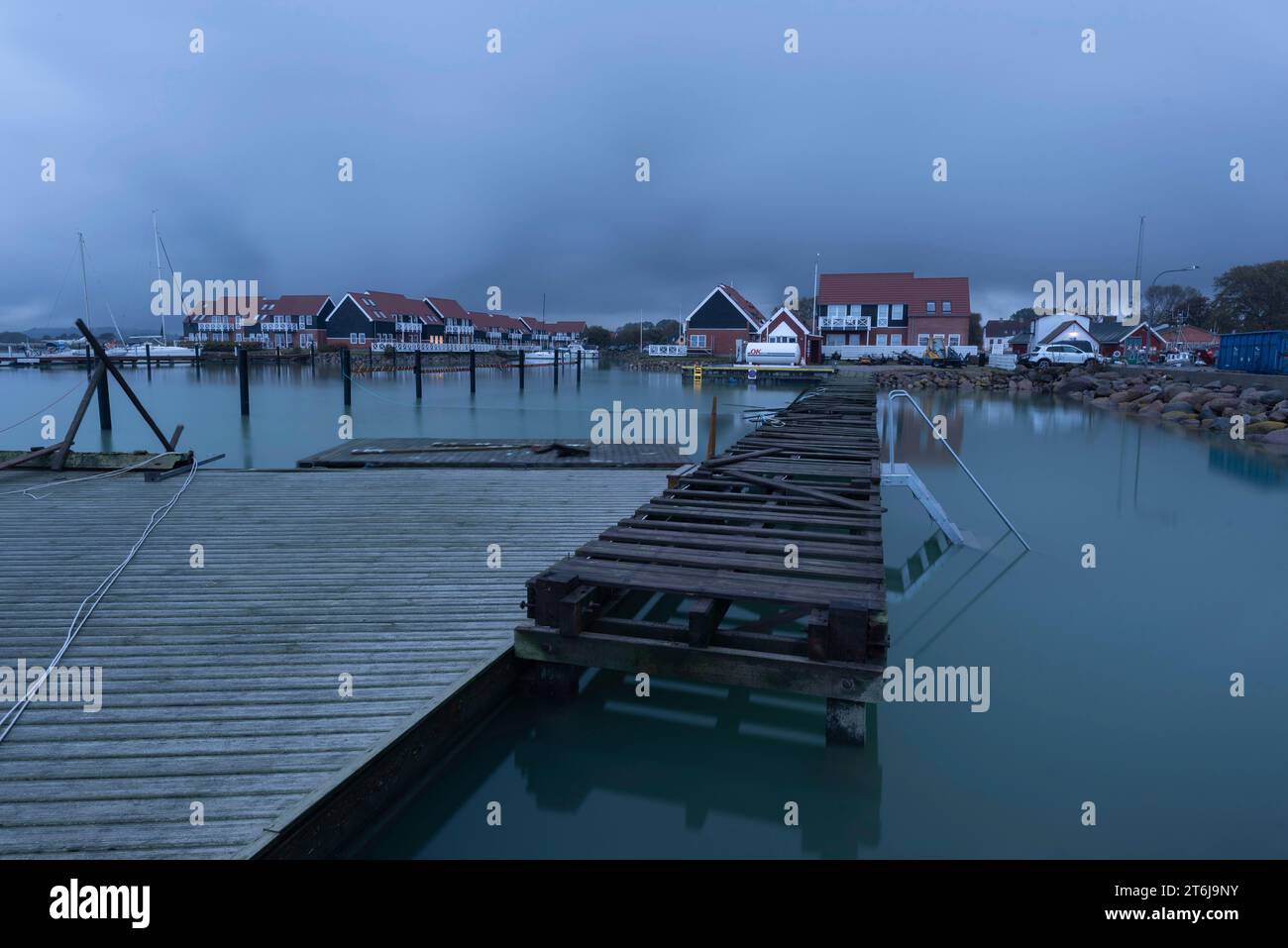Broken jetty after storm surge, Klintholm Havn, Mön Island, Denmark Stock Photo