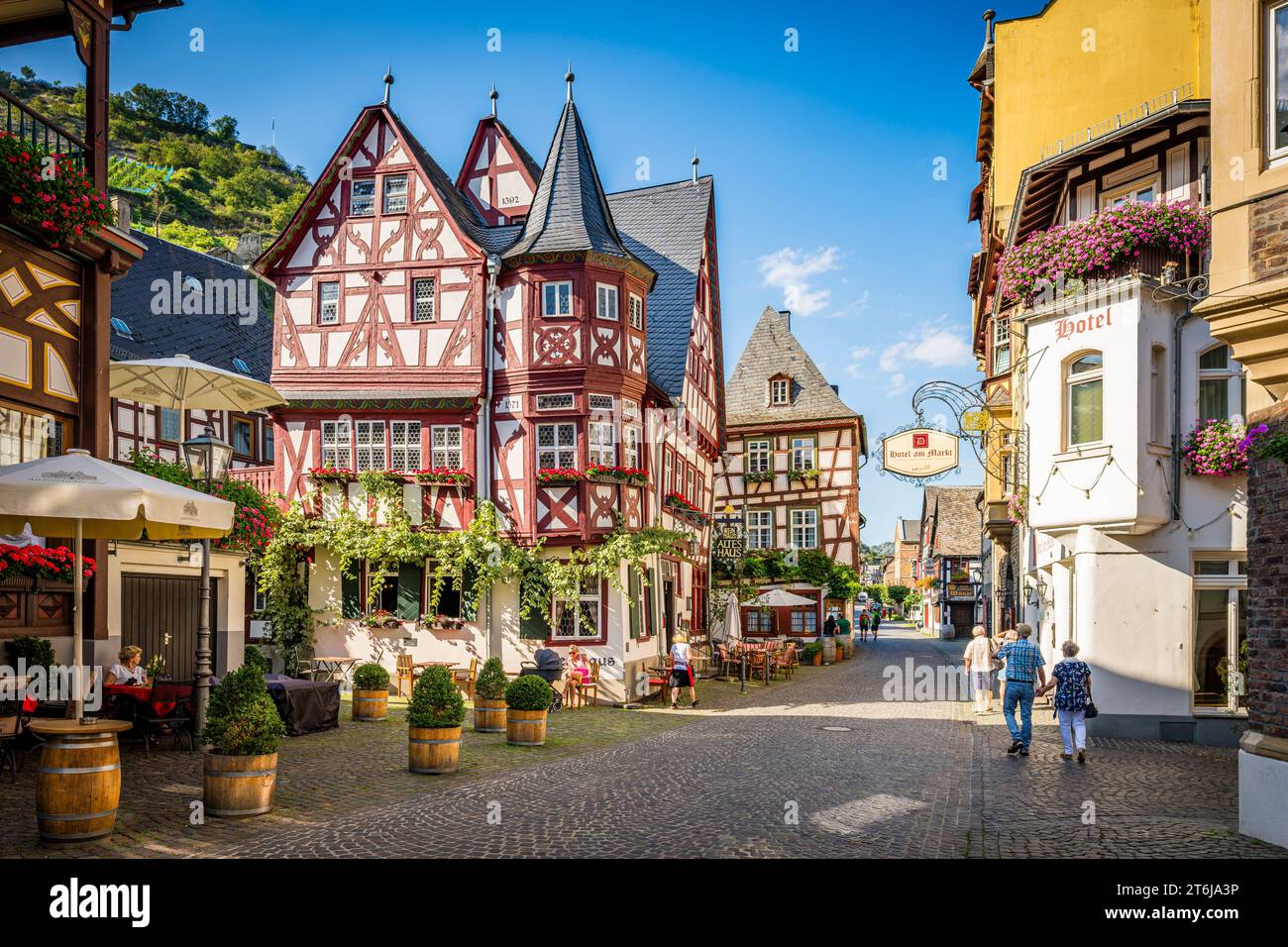 City of Bacharach at the Middle Rhine, 'Altes Haus' in the Oberstrasse, in the back wine tavern 'Zum grünen Baum'. Stock Photo