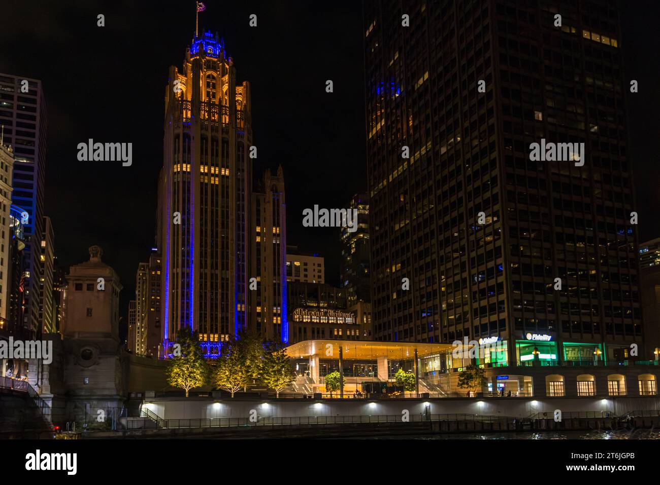 Chicago Tribune and Apple Michigan Avenue at night, Chicago, United States Stock Photo