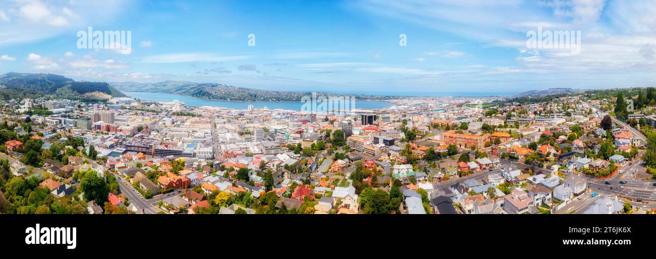Downtown of Historic Dunedin city on Pacific coast of New Zealand South Island - aeraial panorama. Stock Photo