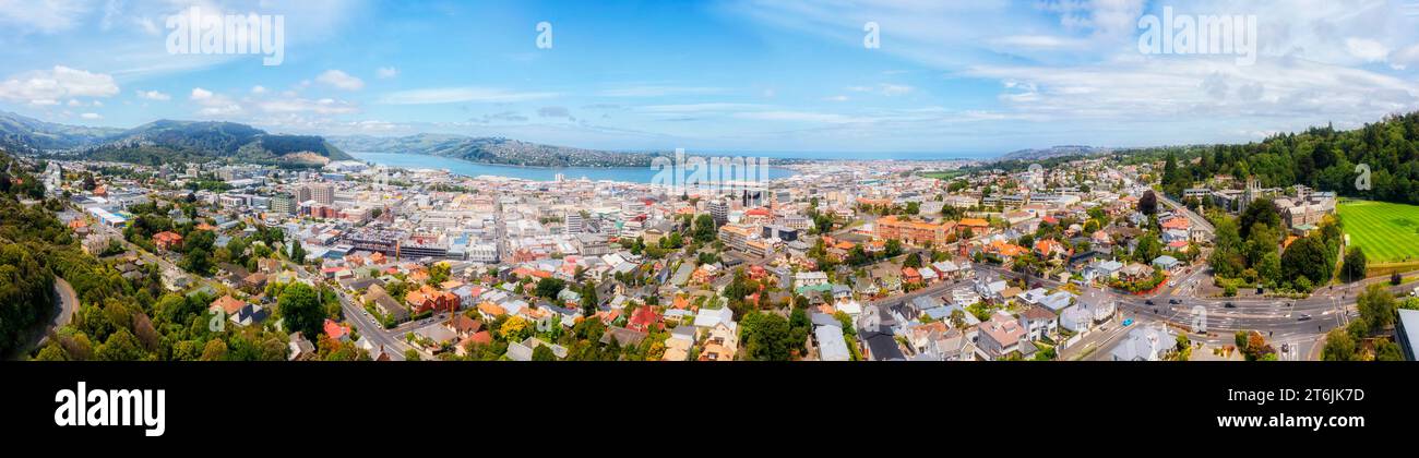 Historic Dunedin city on Pacific coast of New Zealand South Island - aeraial panorama. Stock Photo