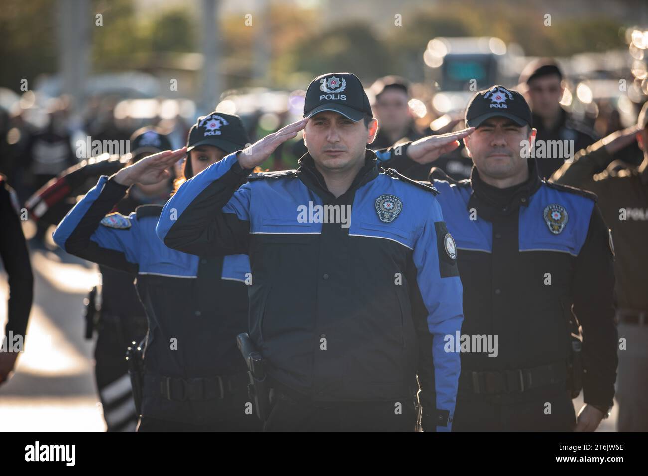 Police officers stand in silence at 09:05 a.m to commemorate the death time of Mustafa Kemal Ataturk, founder of the Republic of Turkey, on the 85th anniversary of his demise at July 15th Martyrs Bridge in Istanbul. Stock Photo