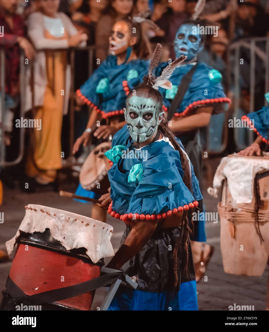 MEXICO CITY, MEXICO - NOVEMBER 04, 2023: Day of the dead parade 2023 in Mexico City, Traditional artist playing drums and skull painting at the tradit Stock Photo