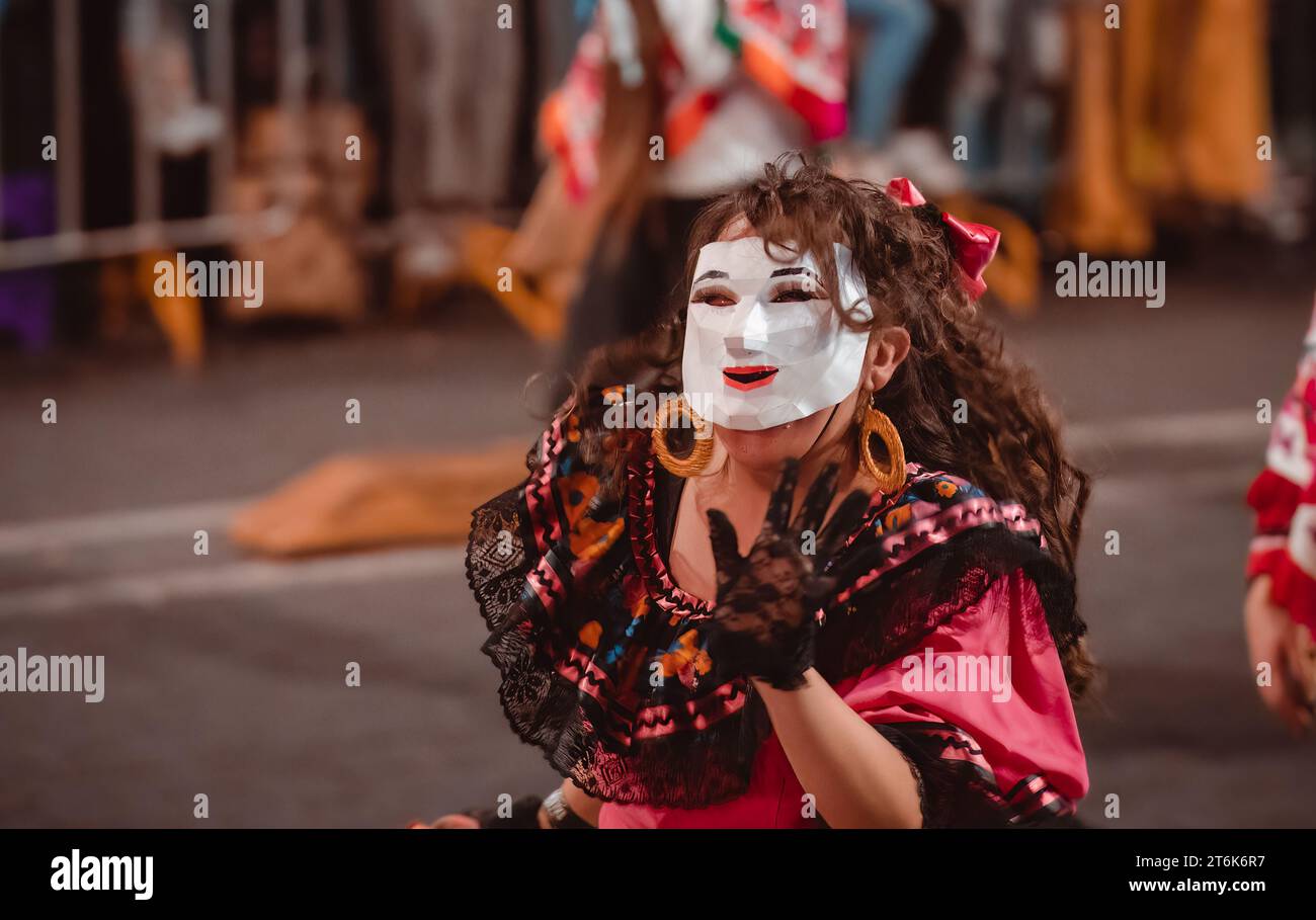 MEXICO CITY, MEXICO - NOVEMBER 04, 2023: Day of the dead parade 2023 in Mexico City, Typical costumes of the region representing death. Stock Photo