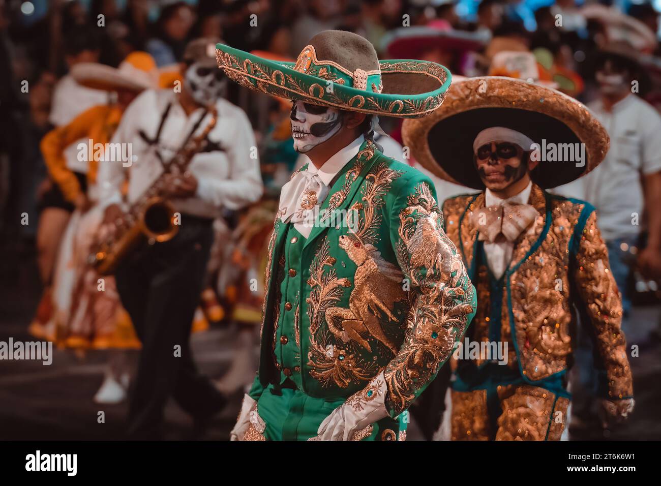 MEXICO CITY, MEXICO - NOVEMBER 04, 2023: Day of the dead parade 2023 in Mexico City, Typical charro costume with skull masks, typical costumes of the Stock Photo