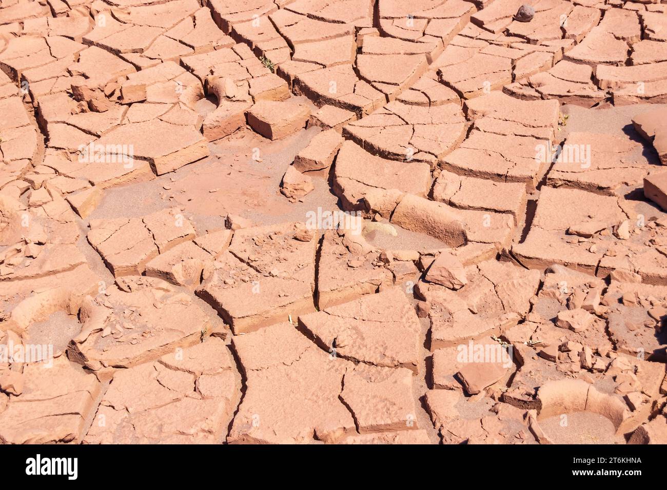 Dry, cracked mud near the Quitor fortress outside San Pedro de Atacama, Chile. Stock Photo