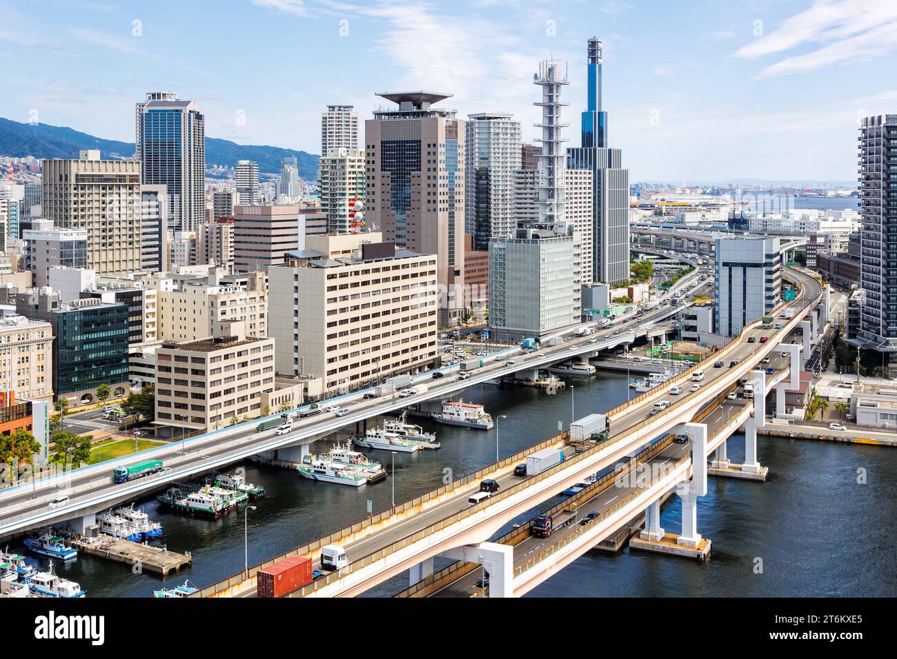 Kobe skyline from above with port and elevated road bridge in Japan Stock Photo