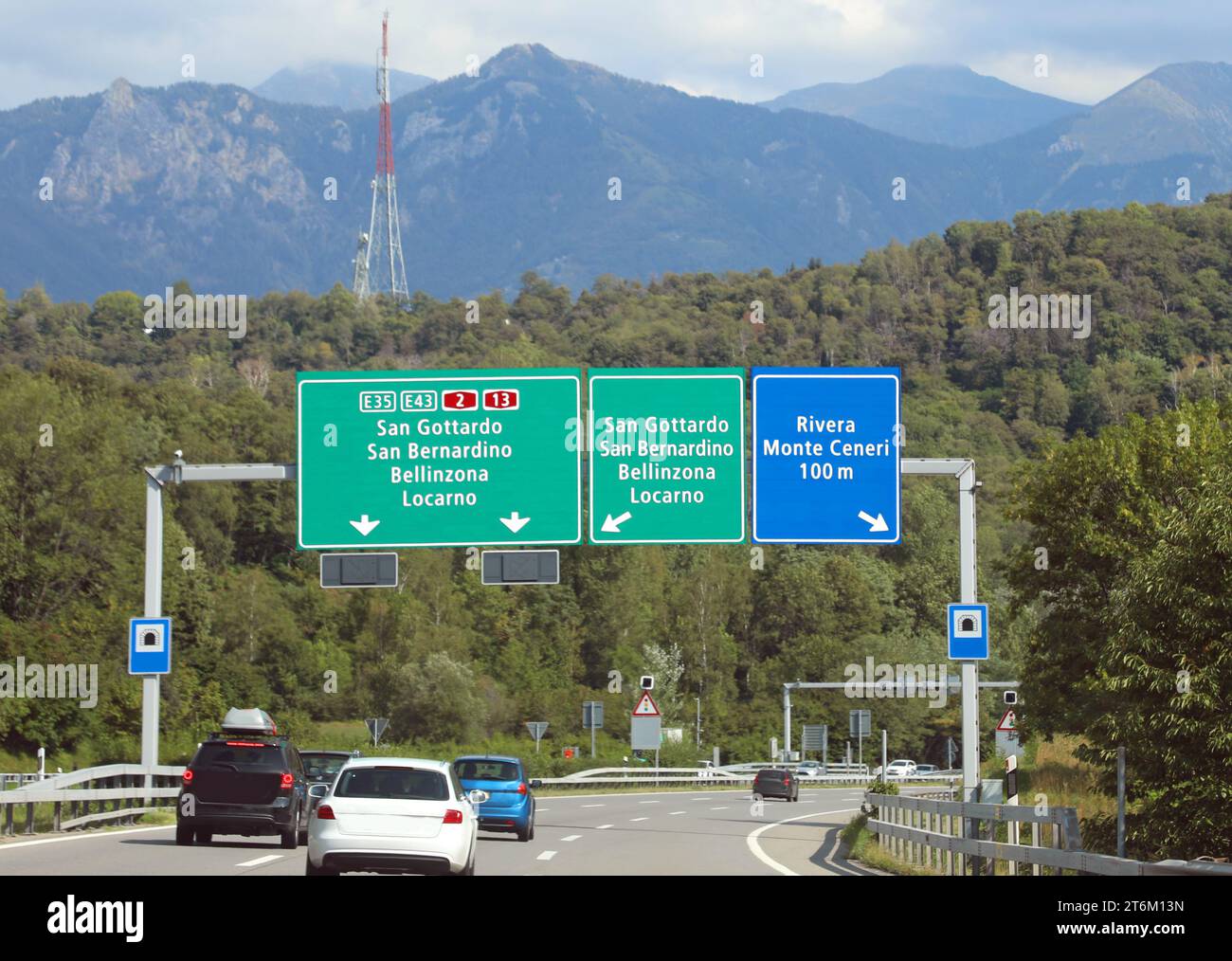 portal with road signs on the motorway with directions to many ...