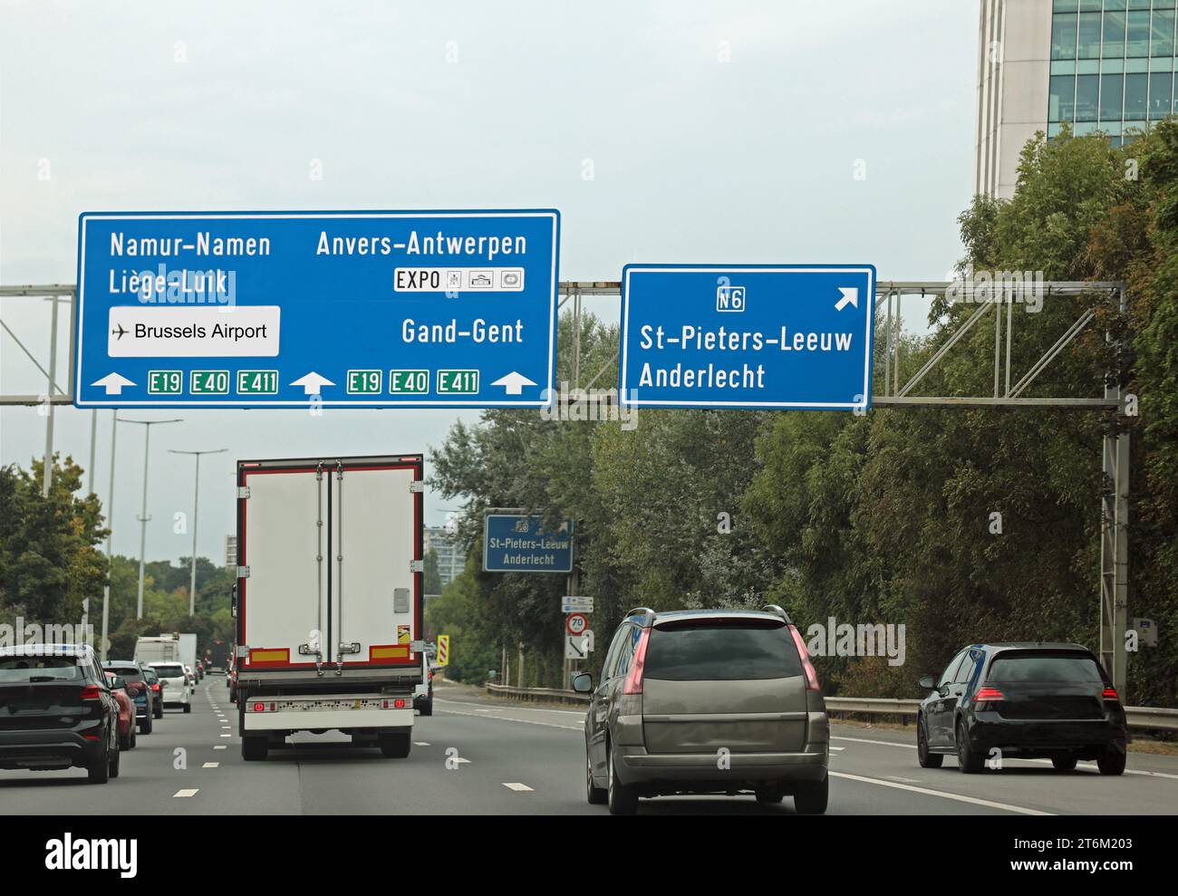 Large road sign on the highway with directions to reach the belgian city of xxxxxxxxxxxxxxxxxx Stock Photo