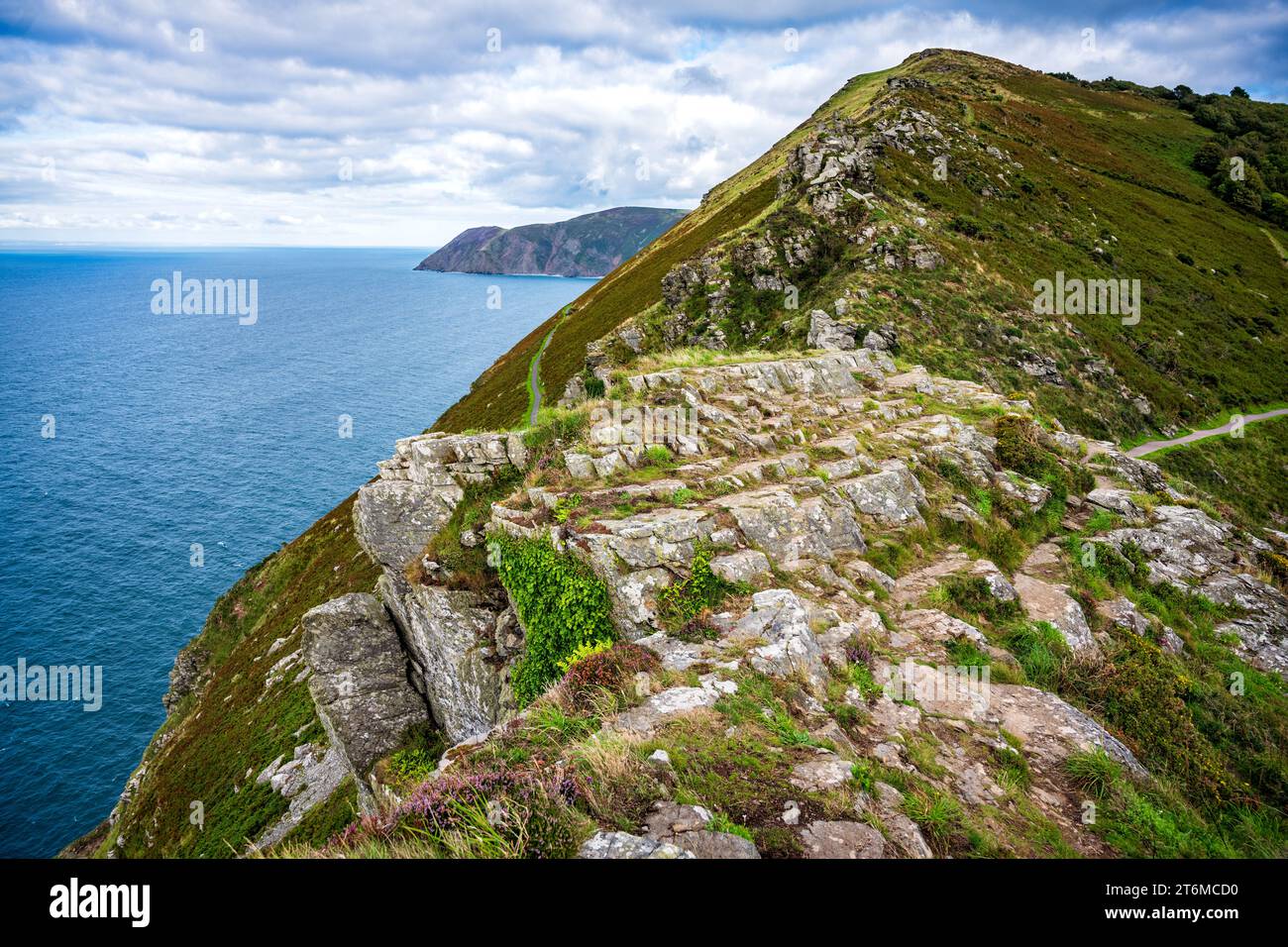 View looking east on the crags at the Valley of Rocks near Lynton, Devon, UK.  Foreland Point is in the distance. Stock Photo