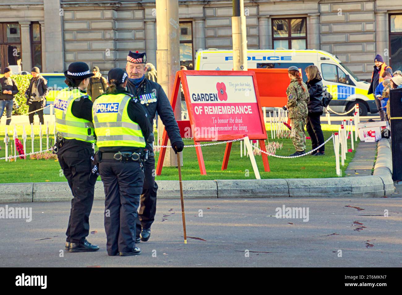 Glasgow, Scotland, UK. 11th November, 2023.Heavy police presence for remembrance garden in george square as people gathered in light of protests. Credit Gerard Ferry/Alamy Live News Stock Photo