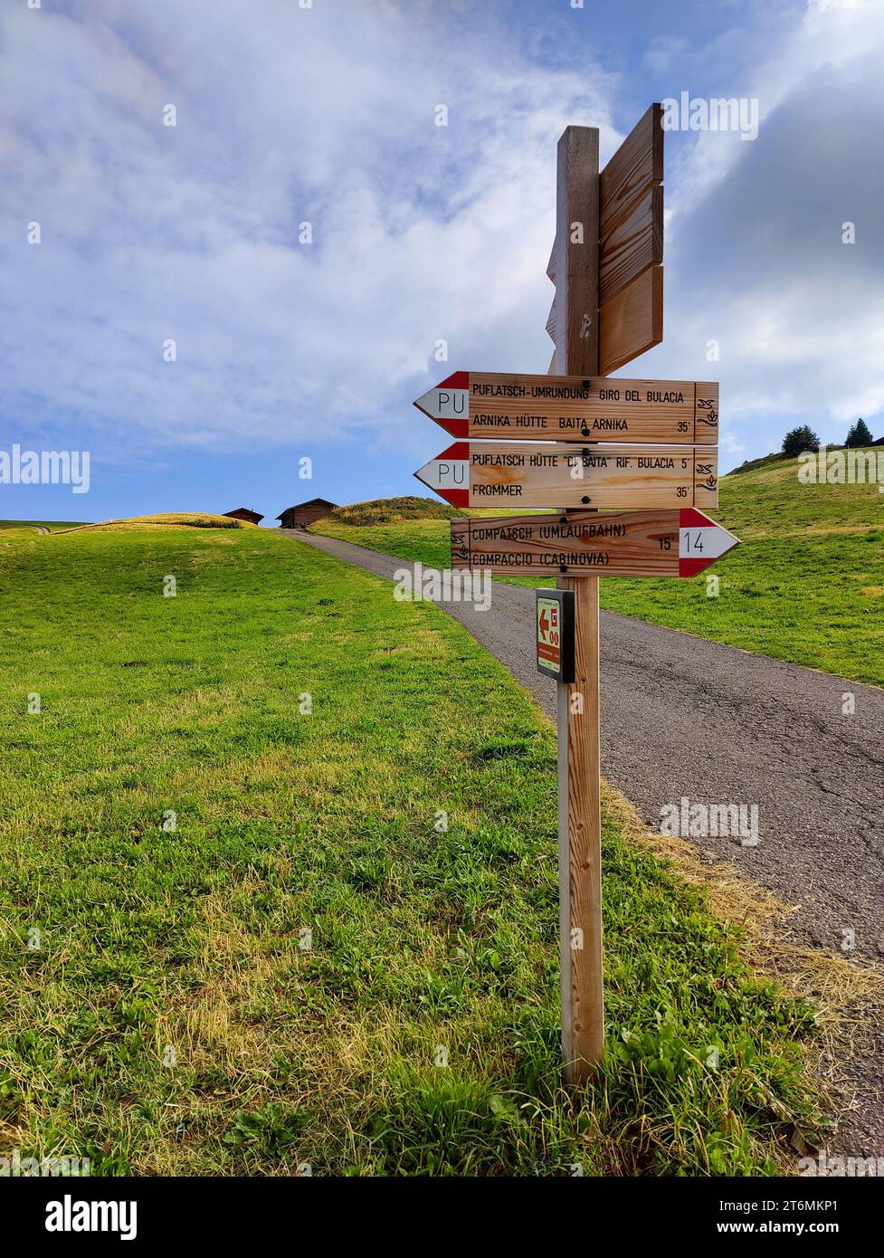 Signpost in Alpi di Siusi, Dolomites, Italy Stock Photo