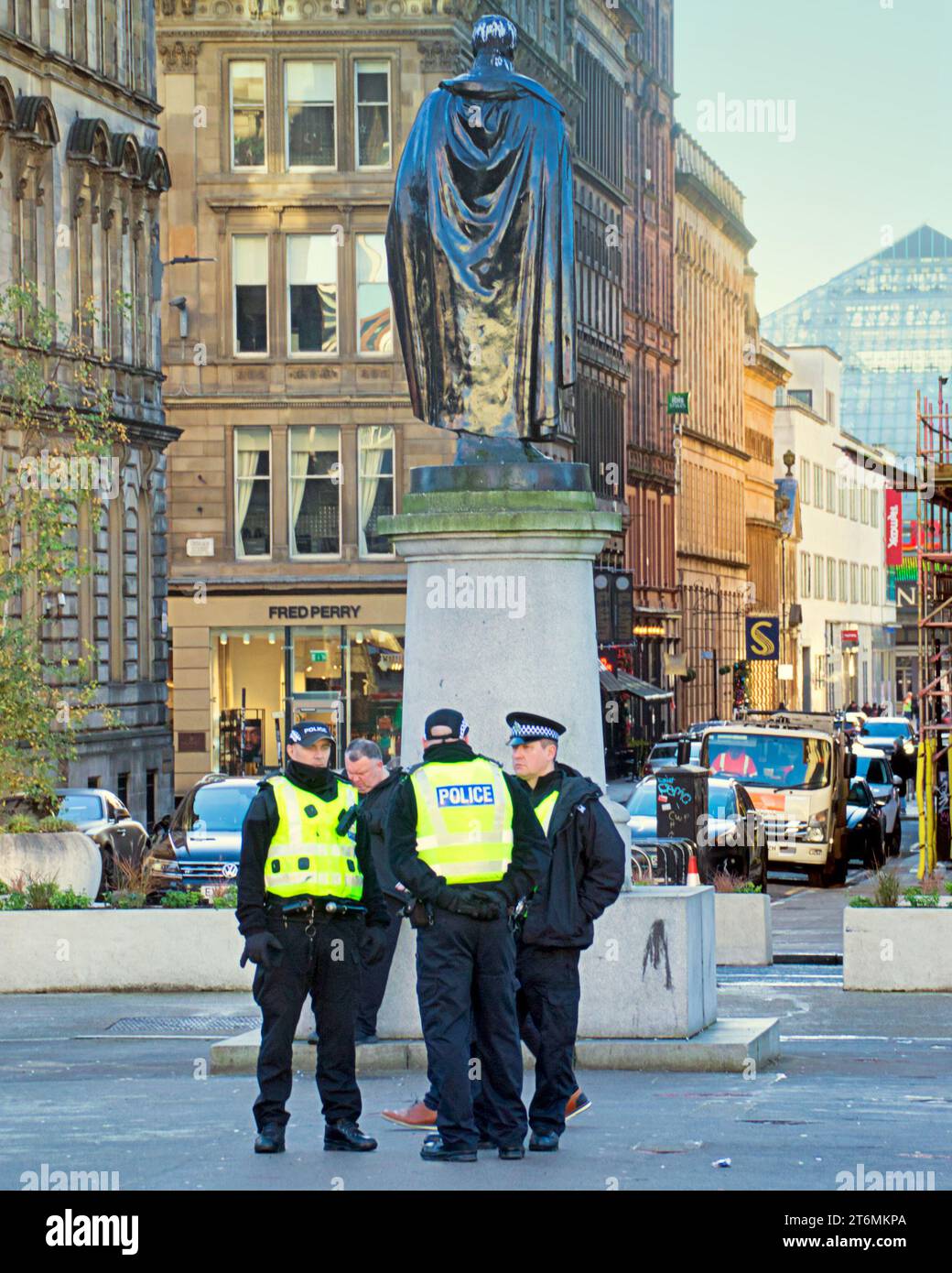 Glasgow, Scotland, UK. 11th November, 2023.Heavy police presence for remembrance garden in george square as people gathered in light of protests. Credit Gerard Ferry/Alamy Live News Stock Photo