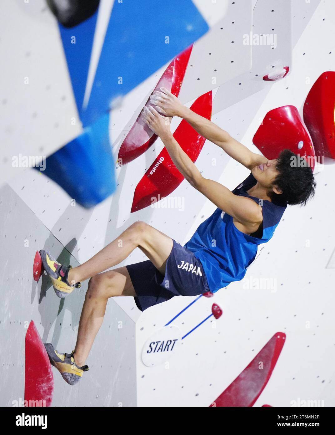 Sorato Anraku of Japan competes in the boulder discipline of the men's