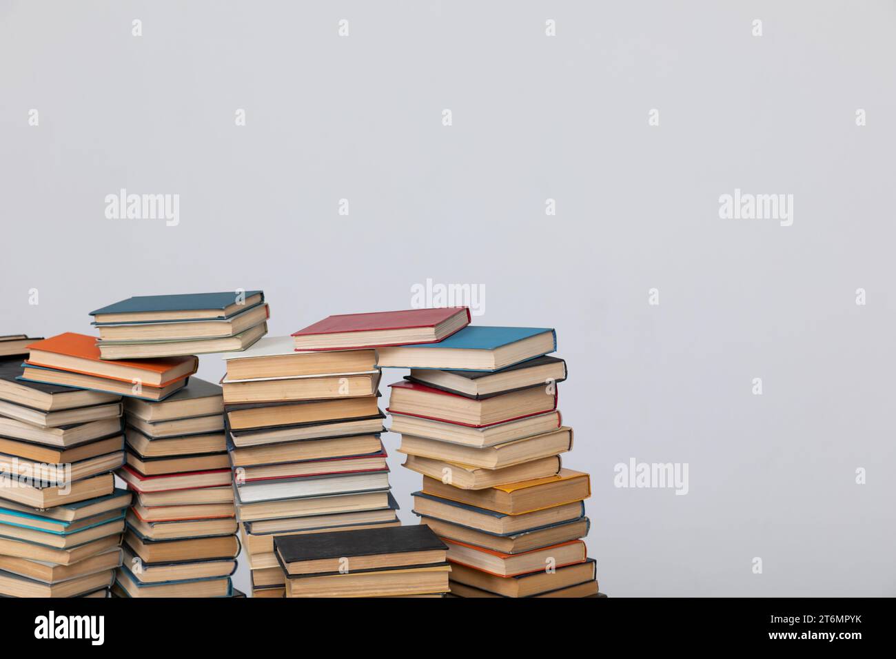 science education stack of books on white background teaching literacy ...