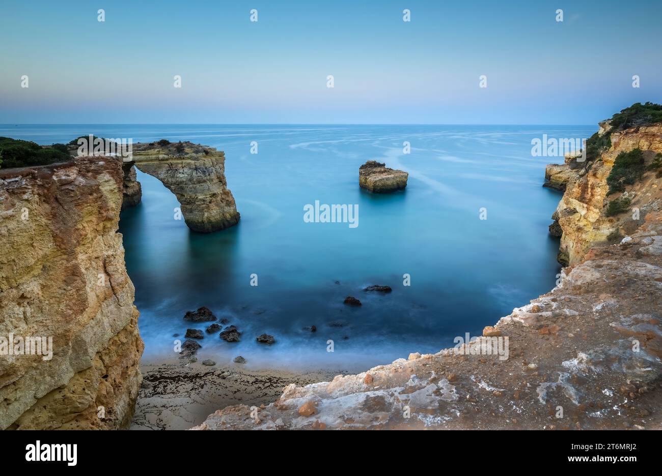 The rock arch known as Arco de Albandeira at Albandeira beach or Praia De Albandeira on the southern Algarve coast of Portugal Stock Photo