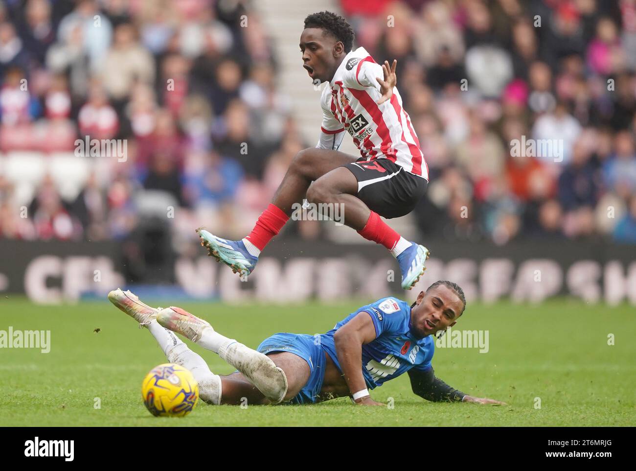 Sunderland’s Abdoullah Ba (top) is tackled by Birmingham City’s Emanuel