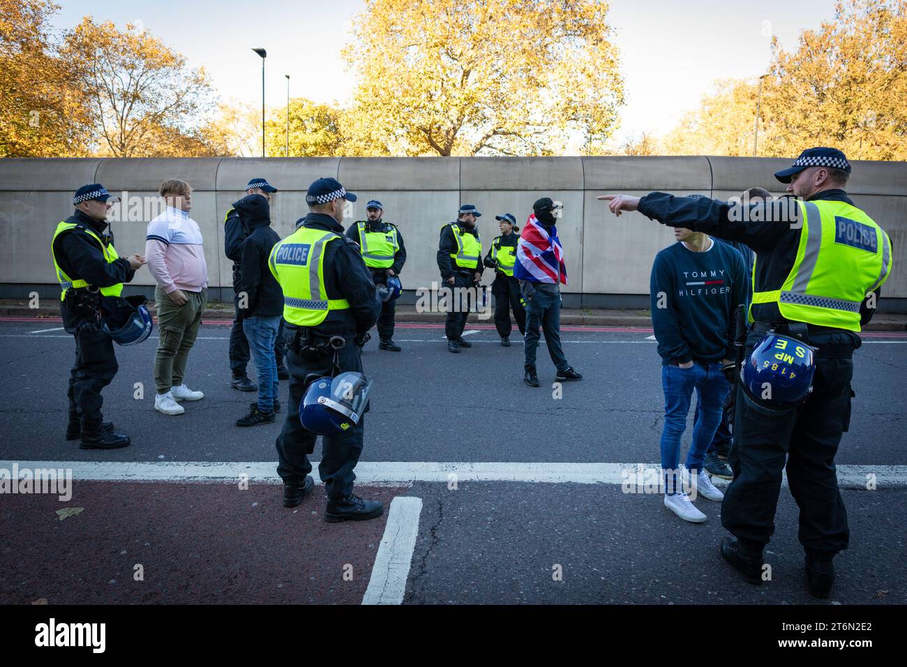 London, UK 11 November, 2023.A small group of is people are led away from a Palestine protest. Cenotaph. Tommy Robinson voiced the motive to deter any Pro-Palestinian protesters that might want to march through Whitehall during Remembrance weekend. This comes after five consecutive weeks of protests to stop the war in Gaza.ÊAndy Barton/Alamy Live News Stock Photo