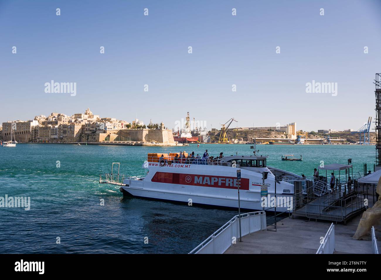 La Valletta, Malta - 17 June 2023: Ferry moored waiting to depart from Valletta to Cospicua, Malta Stock Photo