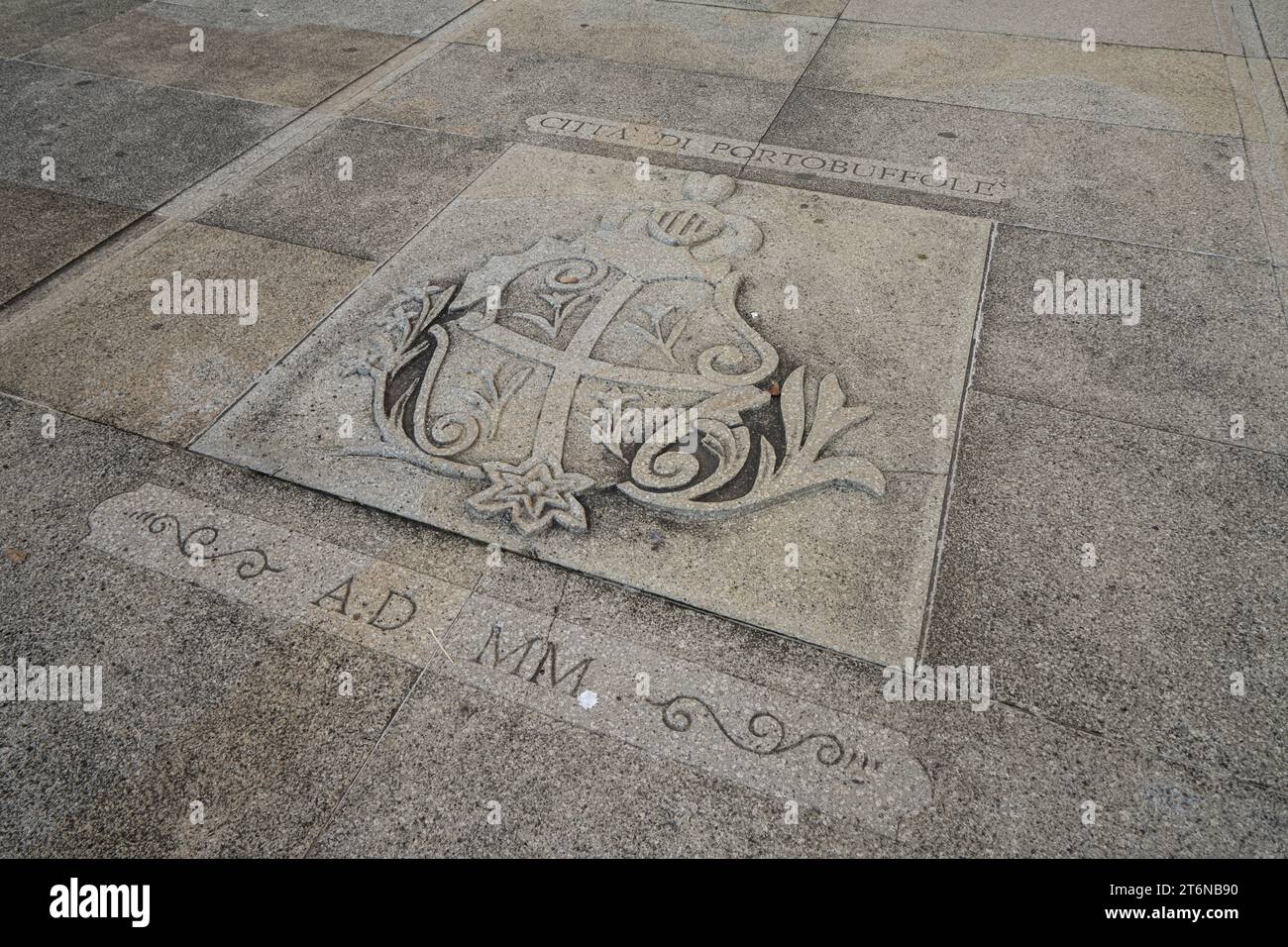 Portobuffolè, Italy. November 9, 2023. the city coat of arms on the pavement of a square Stock Photo